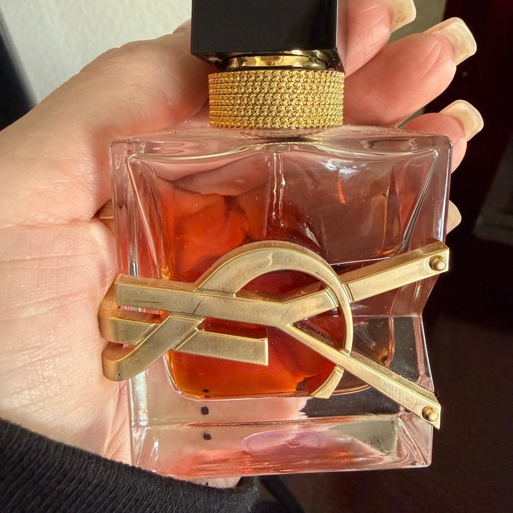 Yves Saint Laurent Gold and Black Perfume Bottle